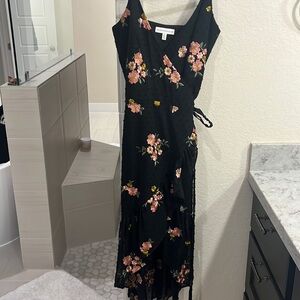 Dress the population black dress with pink flowers.